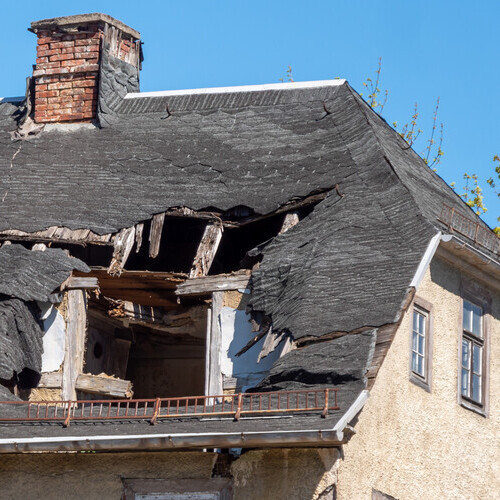 storm damage on a home's roof